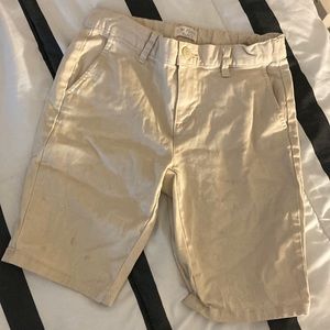 Selling a khaki shorts for kids. The piece of clothing was made in Bangladesh.